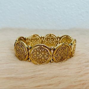 Gold tone medallion stretch bracelet